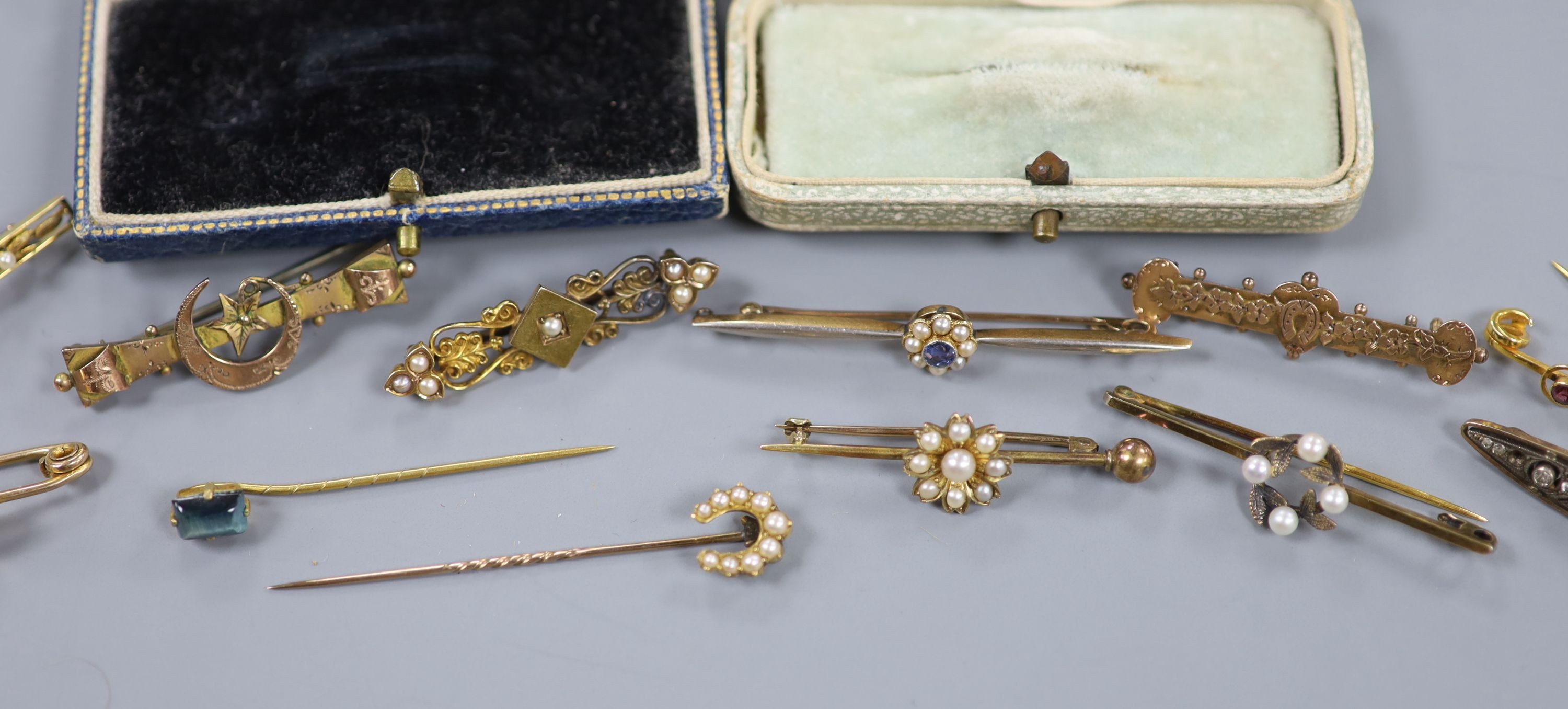 Two Edwardian 15ct and gem set bar brooches, including sapphire and seed pearl, gross 7.4 grams, three 9ct and gem set bar brooches, gross 6.1 grams, four yellow metal and gem set bar brooches, gross 10.4 grams, two yell